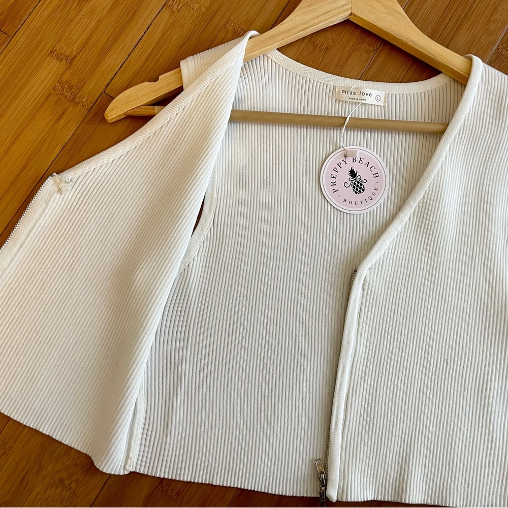 Sleeveless Miss Love zippered crop sweater vest. Looks cute with so many things.